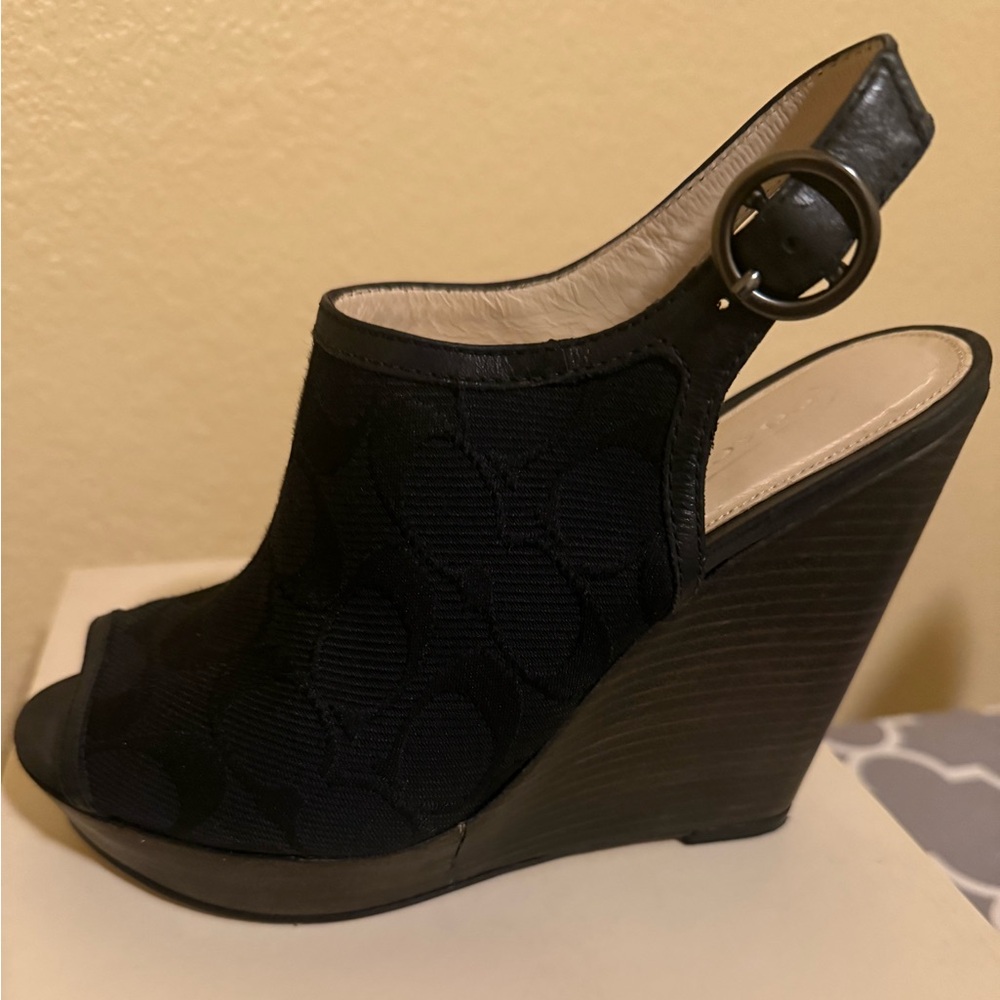 Coach Peep-toe slingback wedges featuring the iconic Coach ‘C’ monogram pattern”